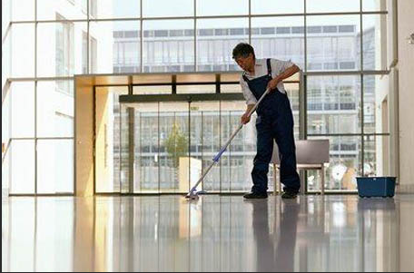 Janitor cleaning the floor